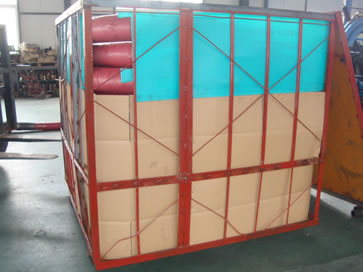Many concrete pump hoses are packaged in a large box.